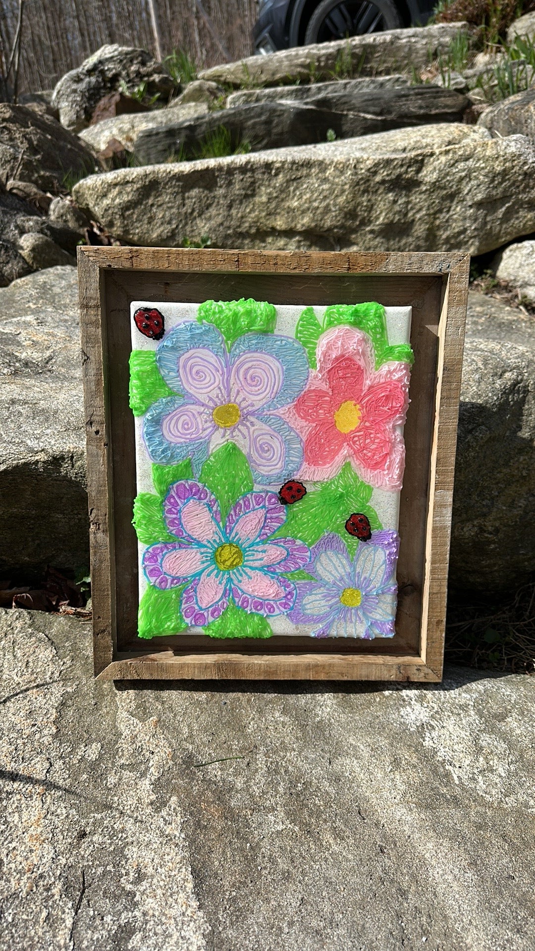 Floral art piece with wooded frame