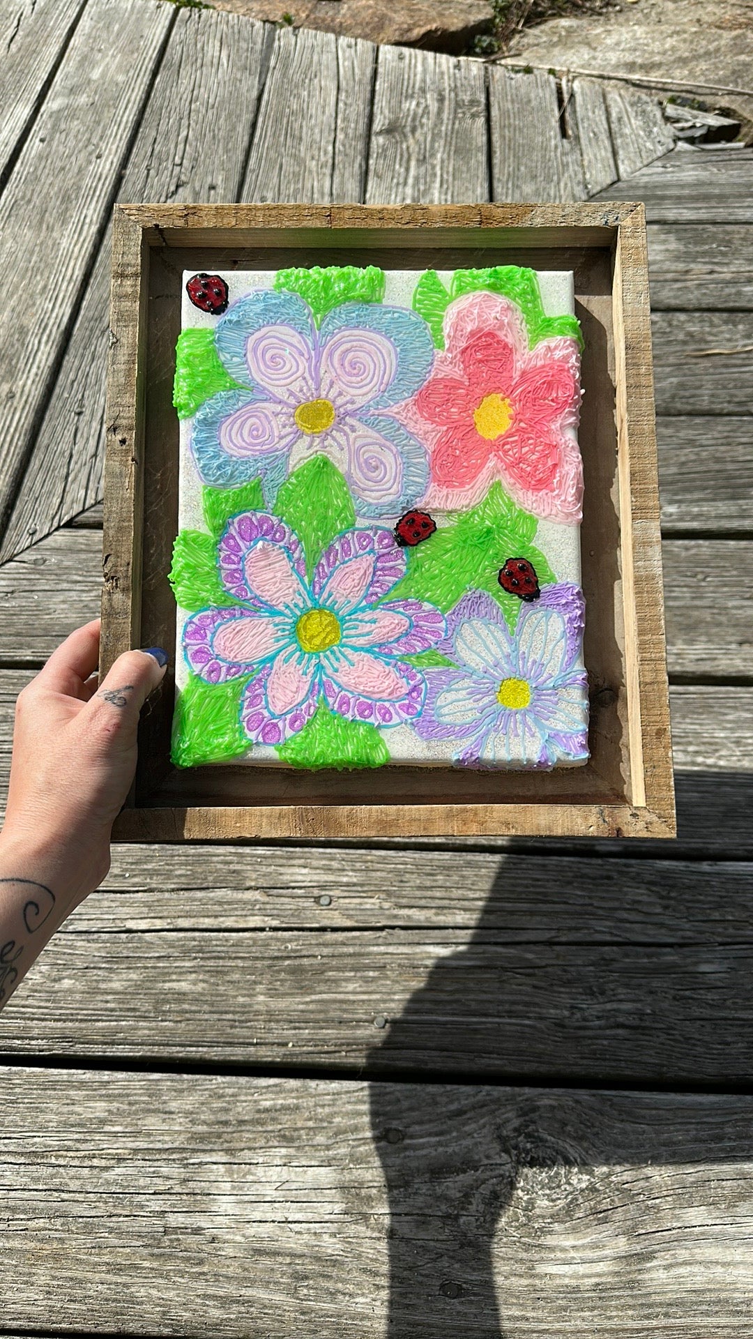Floral art piece with wooded frame